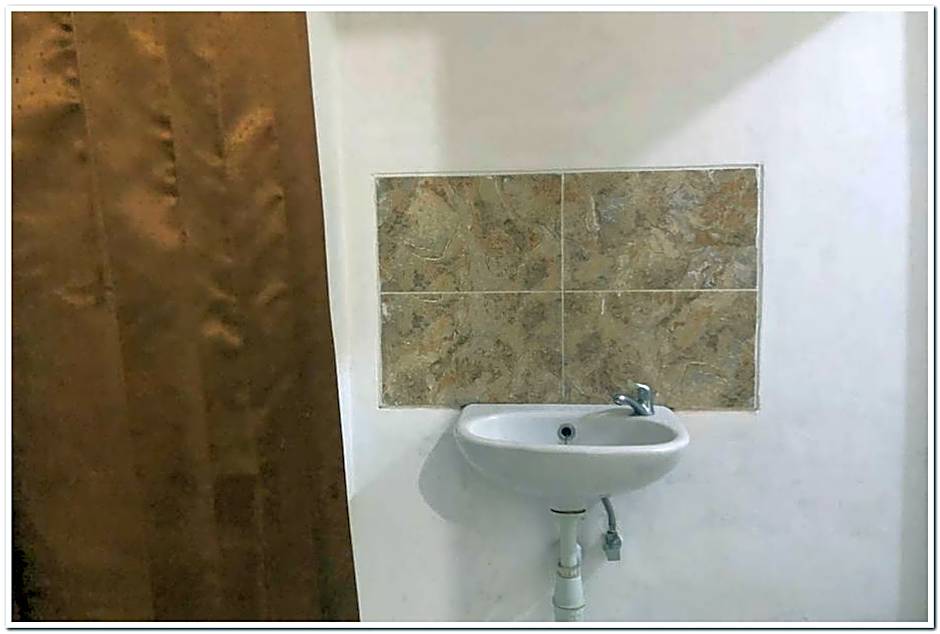 Hotel Baru Inn Batu RedPartner