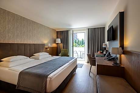 Deluxe Room with Garden View and Balcony