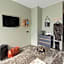 Happy Inn Rooms & Suites