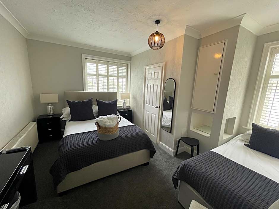 Photo 1 of 2 of Triple Room