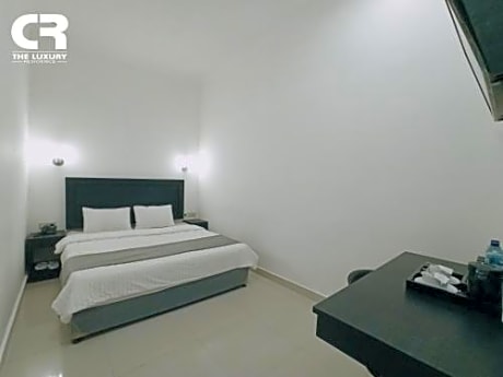 Superior King Room with Shared Bathroom