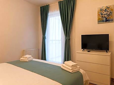 Three-Bedroom Apartment with Balcony