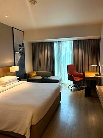 Deluxe Balcony Room, Guest room, 1 King, City view, Balcony