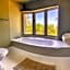 Tingala Lodge - Bed in the Bush