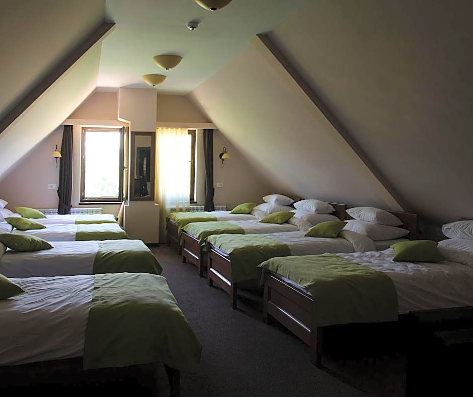 Foto 1 av 4 av Octuple Room