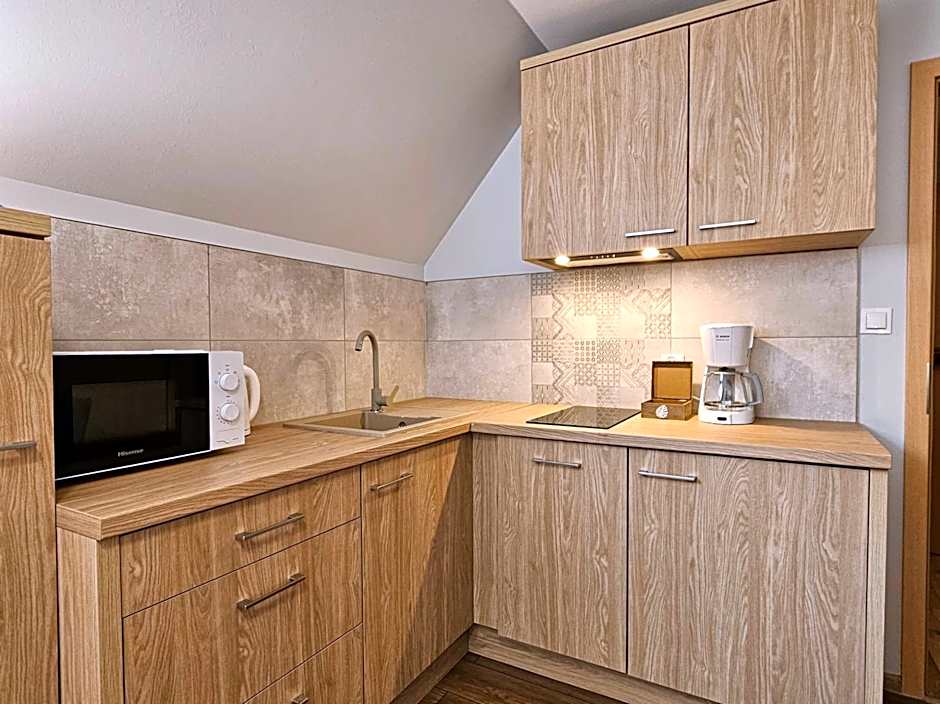 Angela Domki i Pokoje