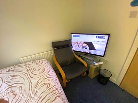 Single Bed in Dormitory Room