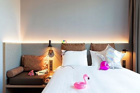 Moxy Family Room with One Queen Bed and Sofa Bed