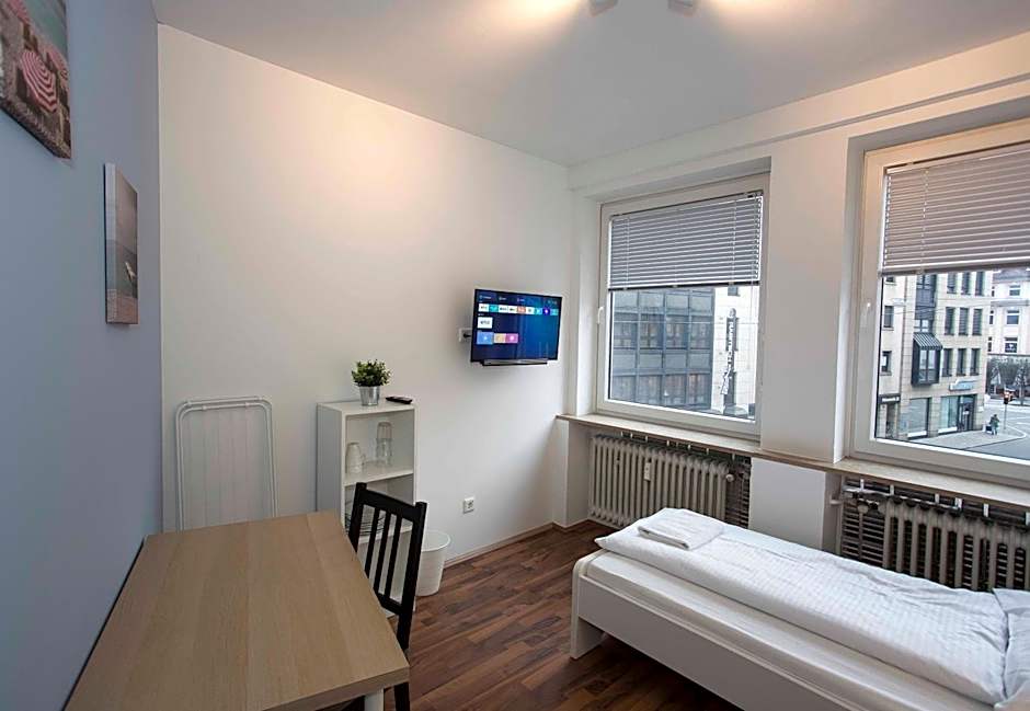 Zentral gelegene Zimmer mit Gemeinschaftsbad und Küche