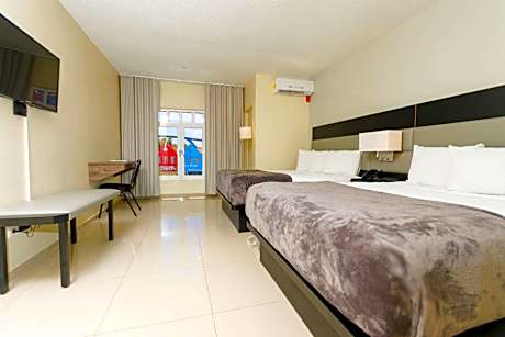 Queen Room with Two Queen Beds and Walk-In Shower - Balcony/Non-Smoking