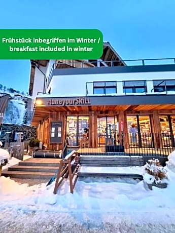 SKILL Mountain Lodge - Ski und Bike Hostel im Sommer mit JOKER CARD