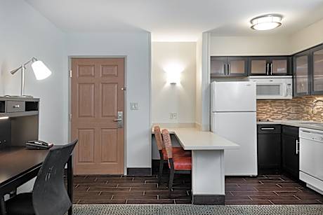 1 Queen 1 Bedroom Suite Mobility Accessible Roll Shower