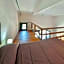 Lofts with private outdoor area and swimming-pool in Badesi