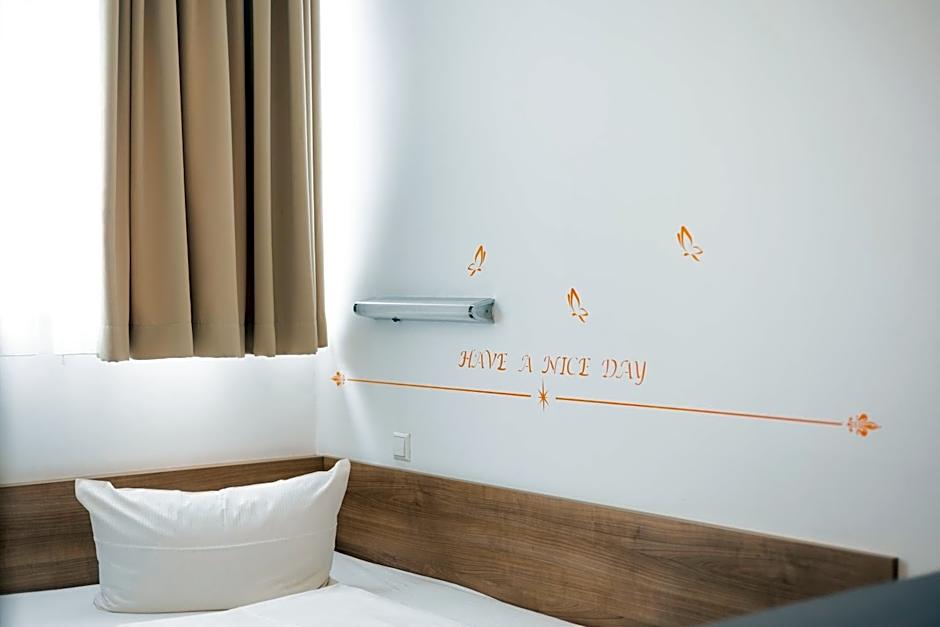 Orange Hotel und Apartments