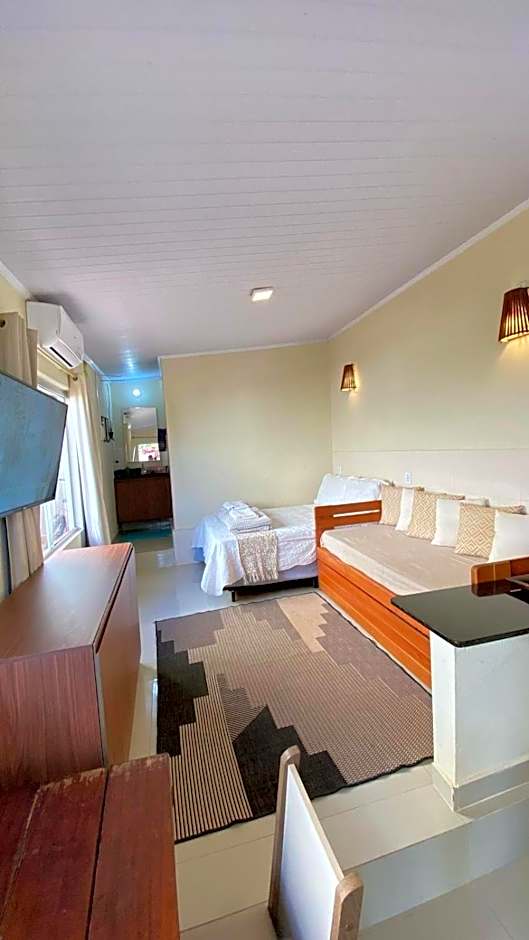 Chalé com ar condicionado e garagem