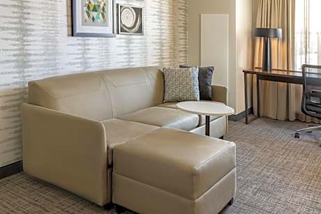One-Bedroom Corner King Suite with Sofa Bed - Mobility/Hearing Accessible with Roll-In Shower
