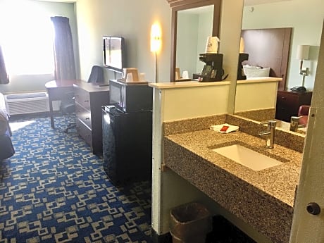 1 King Bed  Non-Smoking Flat Screen Television Microwave And Refrigerator High Speed Internet Access