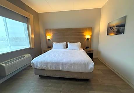 Family Suite with One King, One Queen Bed and Sofa Bed - Fireplace/Non-Smoking