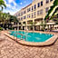 Tropical Beach Condo - Pool, Shops, 86" TV, WiFi