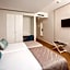Essence Inn Marianos Hotel