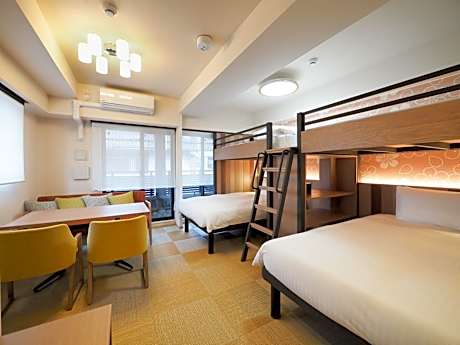 Family Room with Twin Beds and Loft Beds and Kitchen and Washing Machine