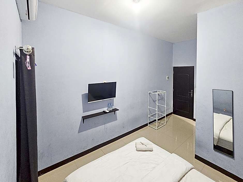 Homestay Sido Joyo near Sunrise Mall Mitra RedDoorz