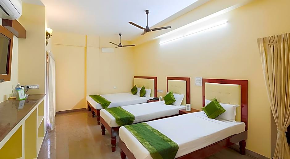 Treebo Grace Inn, 3 Min Walk From Promenade Beach