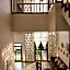 White Wall Riverfront Hotel