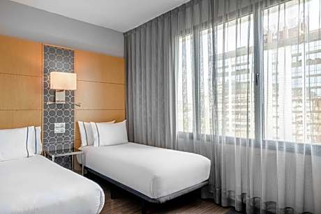 Two-Bedroom Suite with One King and Two Twin Beds