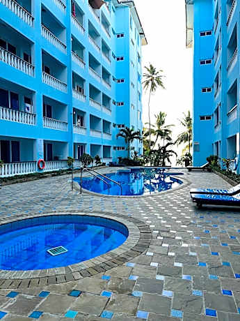 Cowrie Shell Beach Apartments Official