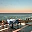 Cavo Orient Beach Hotel & Suites