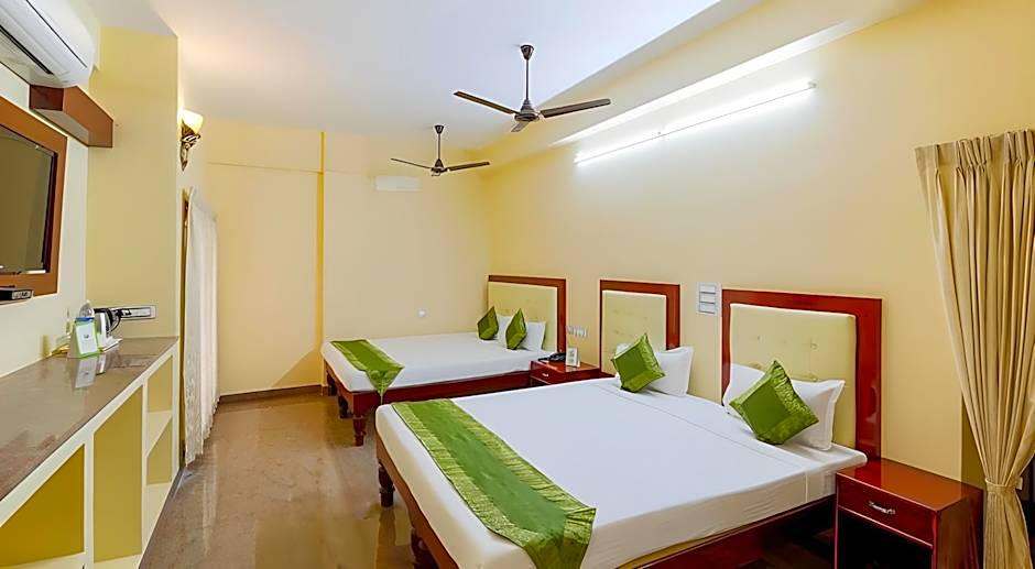 Treebo Grace Inn, 3 Min Walk From Promenade Beach
