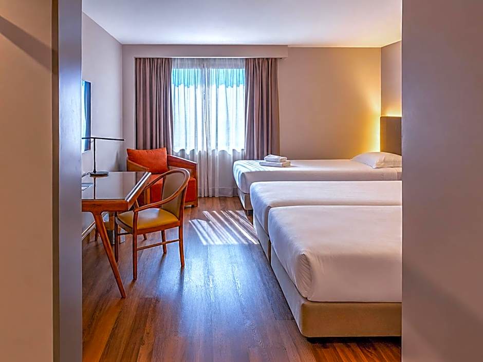 Foto 1 di 4 di Triple Room