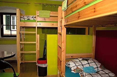 Single Bed in Dormitory Room