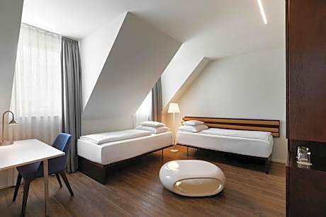 Family Room with Two Twin Beds and Courtyard View