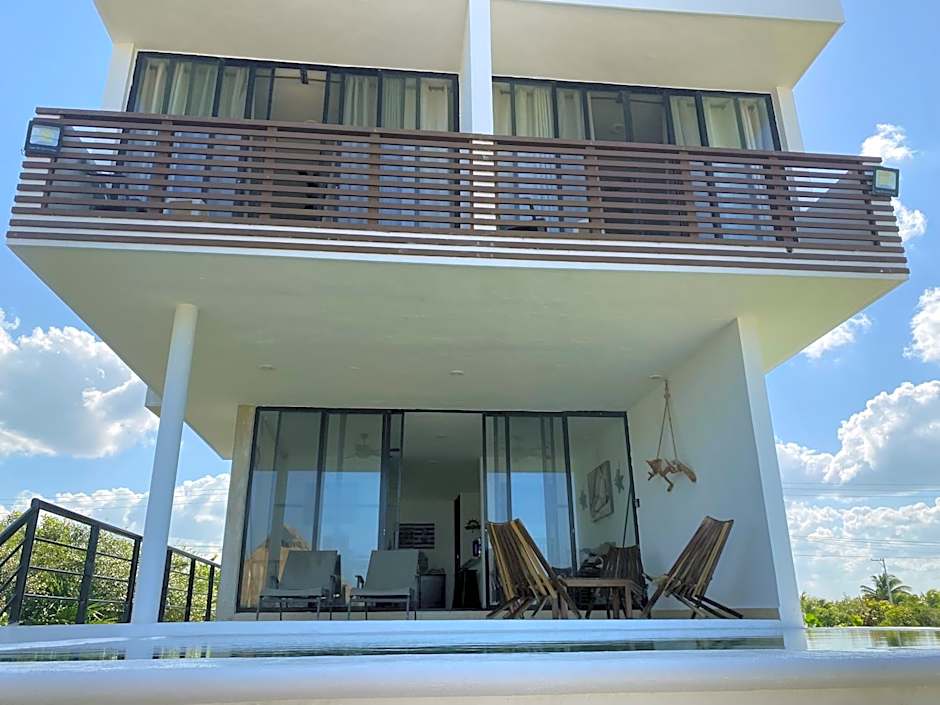 Escape to Paradise, Minimalist 4-BR Beachfront, 300 Mbps with amazing views