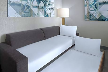 Queen Suite with Two Queen Beds, City View and Trundle Sofa
