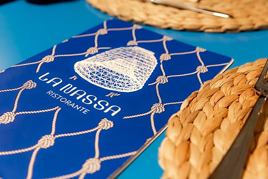 Strand Hotel Delfini