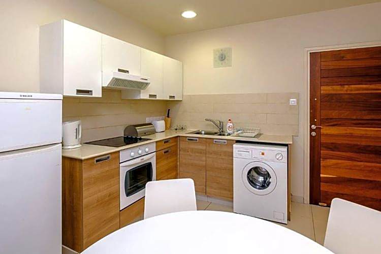 Les Palmiers Beach Boutique Hotel & Luxury Apartments