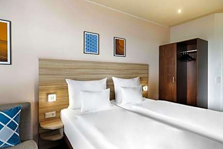 Twin Room with Balcony and City View