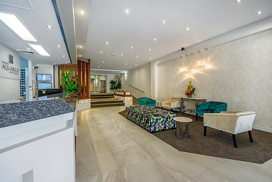 Surfers Aquarius on the Beach