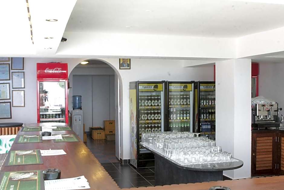 Cowrie Shell Beach Apartments Official