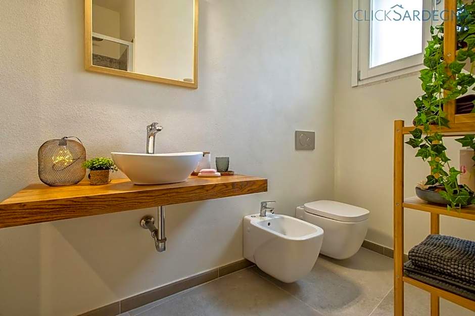 ClickSardinia Alghero Spectacular waterfront Neptune apartment with sea-facing terraces and garden