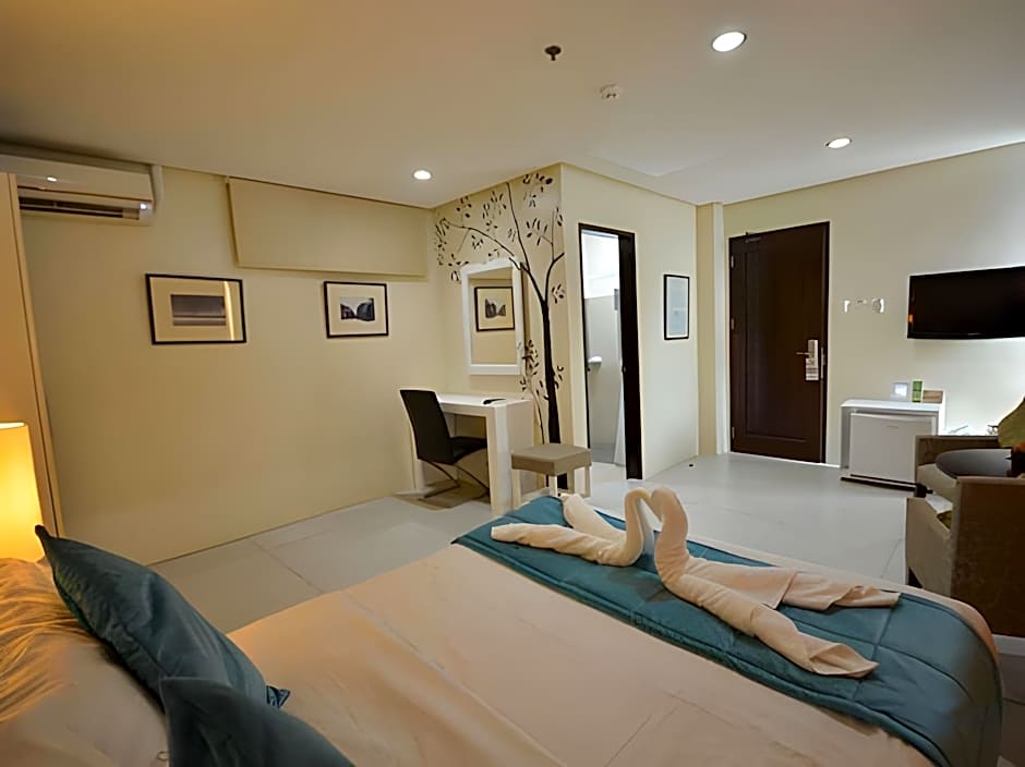 Holiday Suites Business District - Formerly Empire Suites Hotel