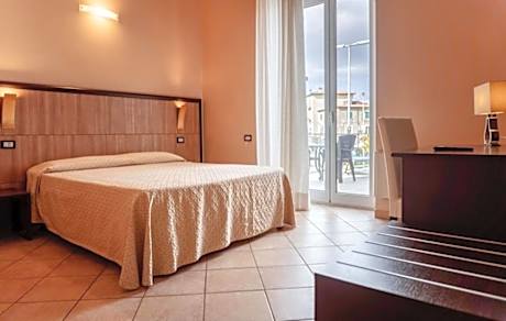 Quadruple Room (2 Adults + 2 Children)