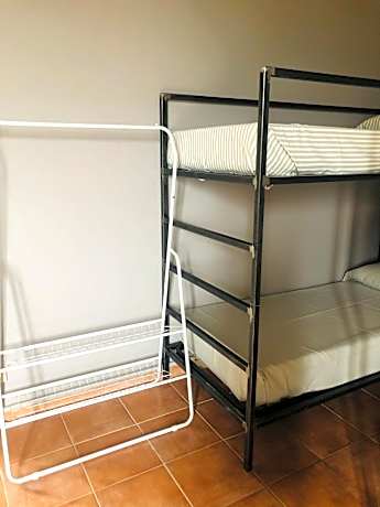 Single Bed in Female Dormitory Room