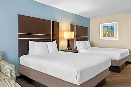 2 Queen Beds, Smoking Room, High Speed Internet Access, Coffee Maker, Iron And Ironing Board, Microw