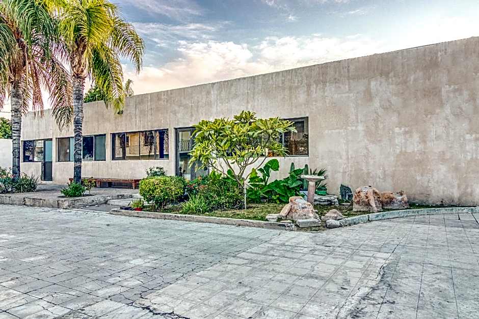 Capital O Hotel La Siesta