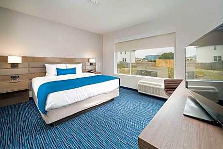 King Suite with Roll - In Shower - Disability Access