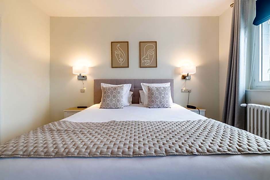 Hôtel Échappée en Baie - Parking privé gratuit dont forfaits bornes électriques réservable